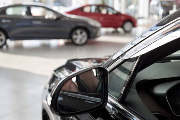 New cars at automotive showroom.